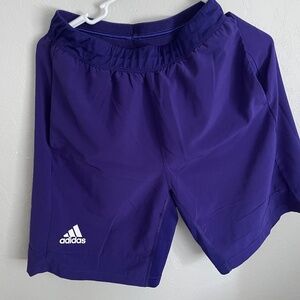 Purple Adidas shorts